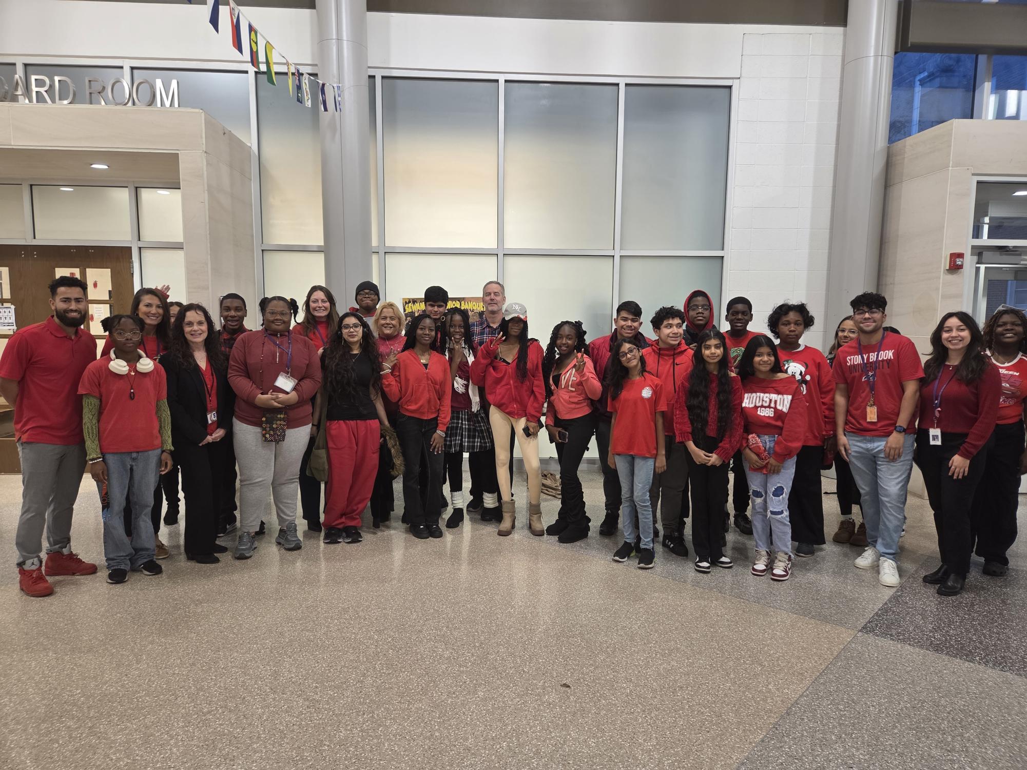 Students faculty, and staff gather outside of the atrium for “Be Red-y to be Drug Free” Day