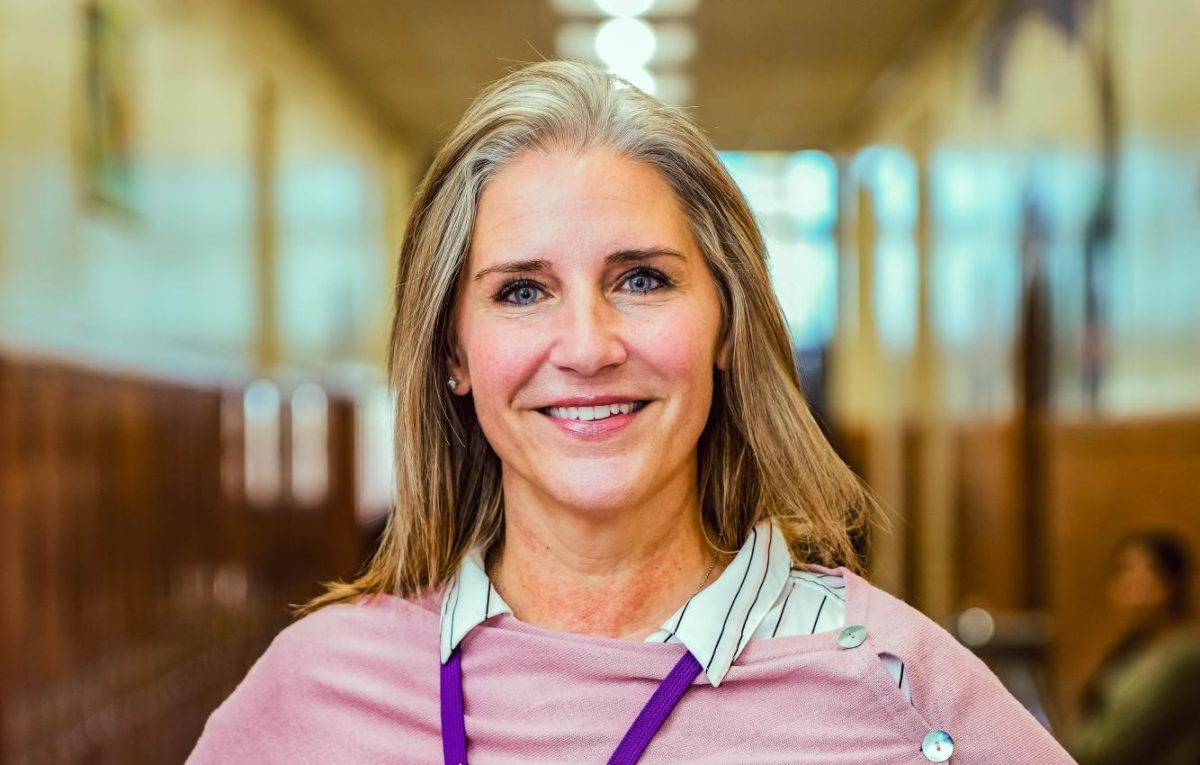 Ms. Walsh in the halls of Sewanhaka
